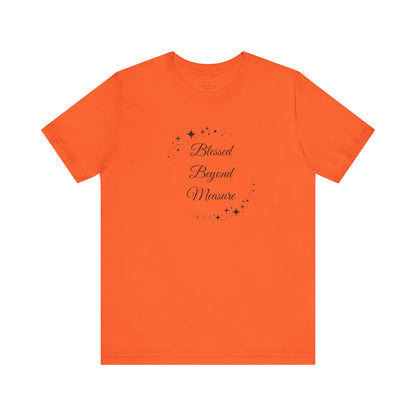 Vibrant orange "Blessed Beyond Measure" T-shirt with an uplifting message and star accents. A bold and cheerful choice for spreading positivity. Sizes: XS, S, M, L, XL, 2XL, 3XL. Luminous Gem Designs.