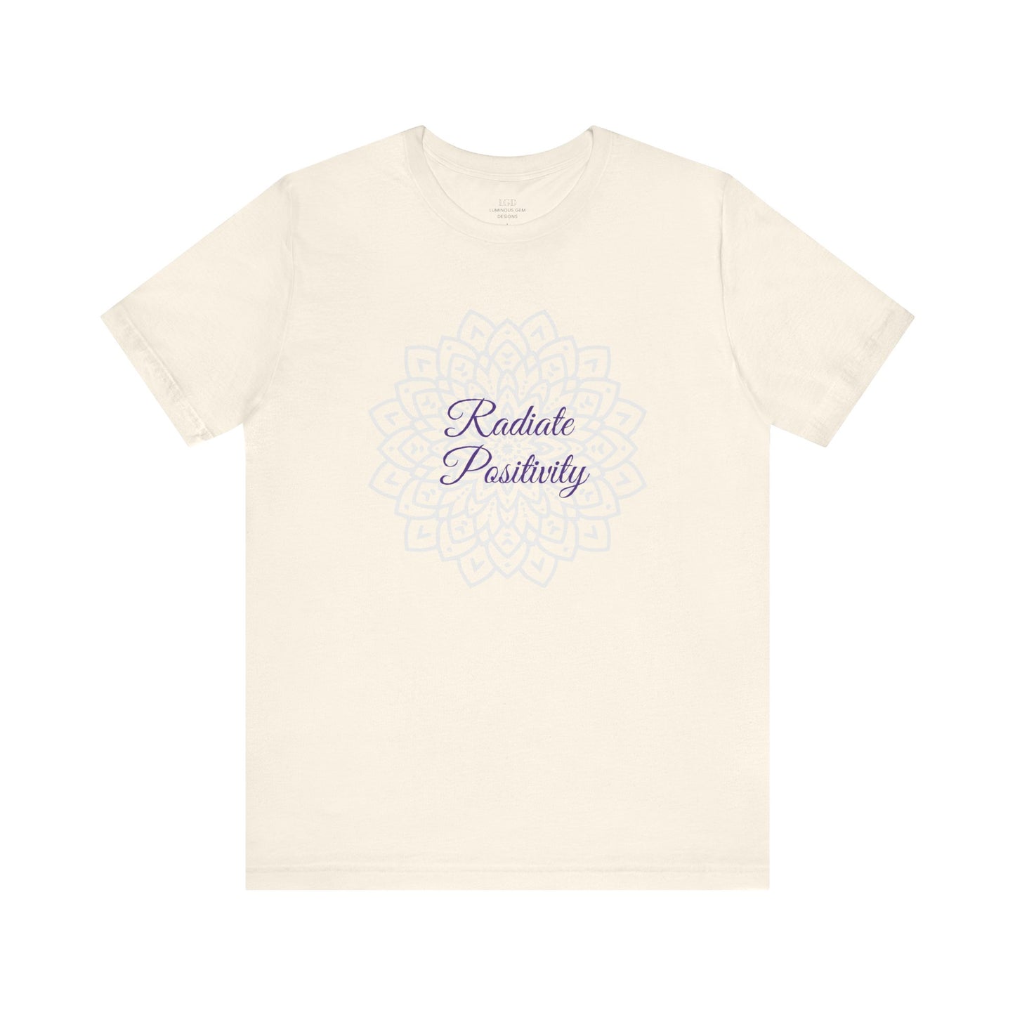 Minimalist natural "Radiate Positivity" T-shirt featuring a calming mandala print. Comfortable, lightweight, and perfect for spreading good vibes. Sizes: XS, S, M, L, XL, 2XL, 3XL. Luminous Gem Designs.