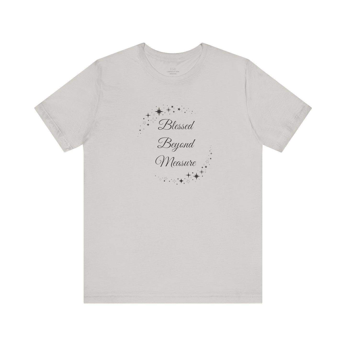 Sleek silver "Blessed Beyond Measure" T-shirt with an inspiring quote and delicate star details. Lightweight, breathable, and versatile. Sizes: XS, S, M, L, XL, 2XL, 3XL. Luminous Gem Designs.