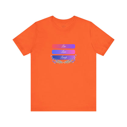 Bright orange "Live Love Laugh" T-shirt, radiating warmth and encouragement. Made from soft, lightweight cotton for a relaxed and trendy look. Sizes: XS, S, M, L, XL, 2XL, 3XL. Luminous Gem Designs