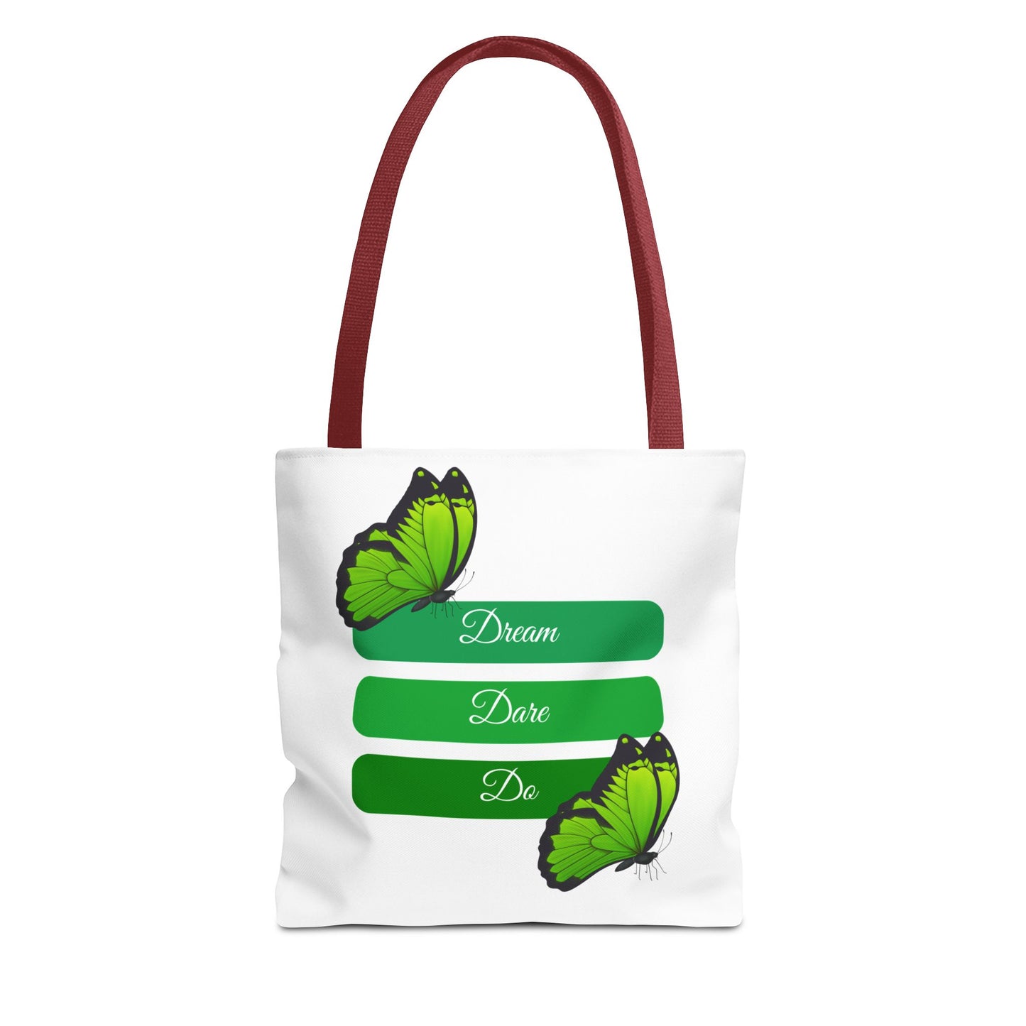 Stylish white Dream, Dare & Do tote bag with red handles, featuring a green-toned background with uplifting words and delicate butterfly designs. Crafted from 100% polyester for durability and practicality. Available in sizes 13"x13", 16"x16", 18"x18". Luminous Gem Designs.