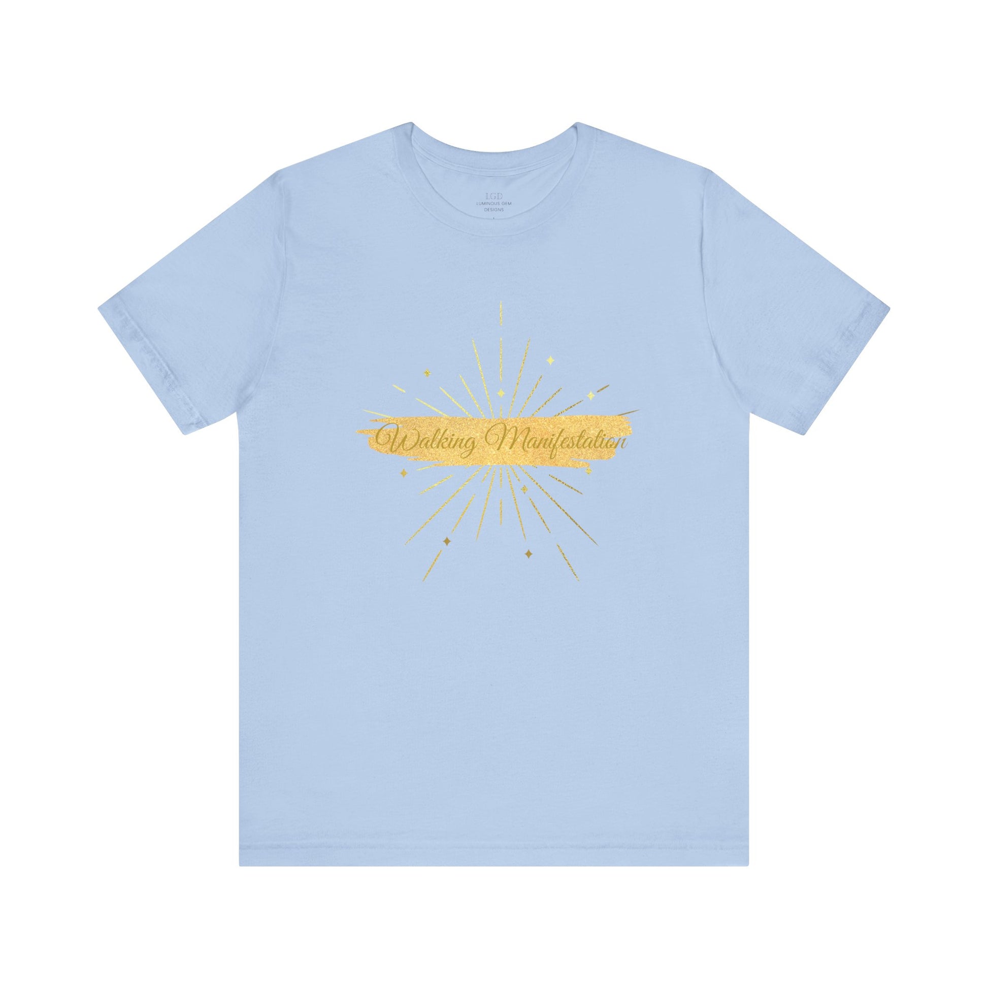 Baby blue "Walking Manifestation" T-shirt with a bold gold design and fireworks. A soft, breathable tee for those who believe in confidence, positivity, and success. Sizes: XS, S, M, L, XL, 2XL, 3XL. Luminous Gem Designs.