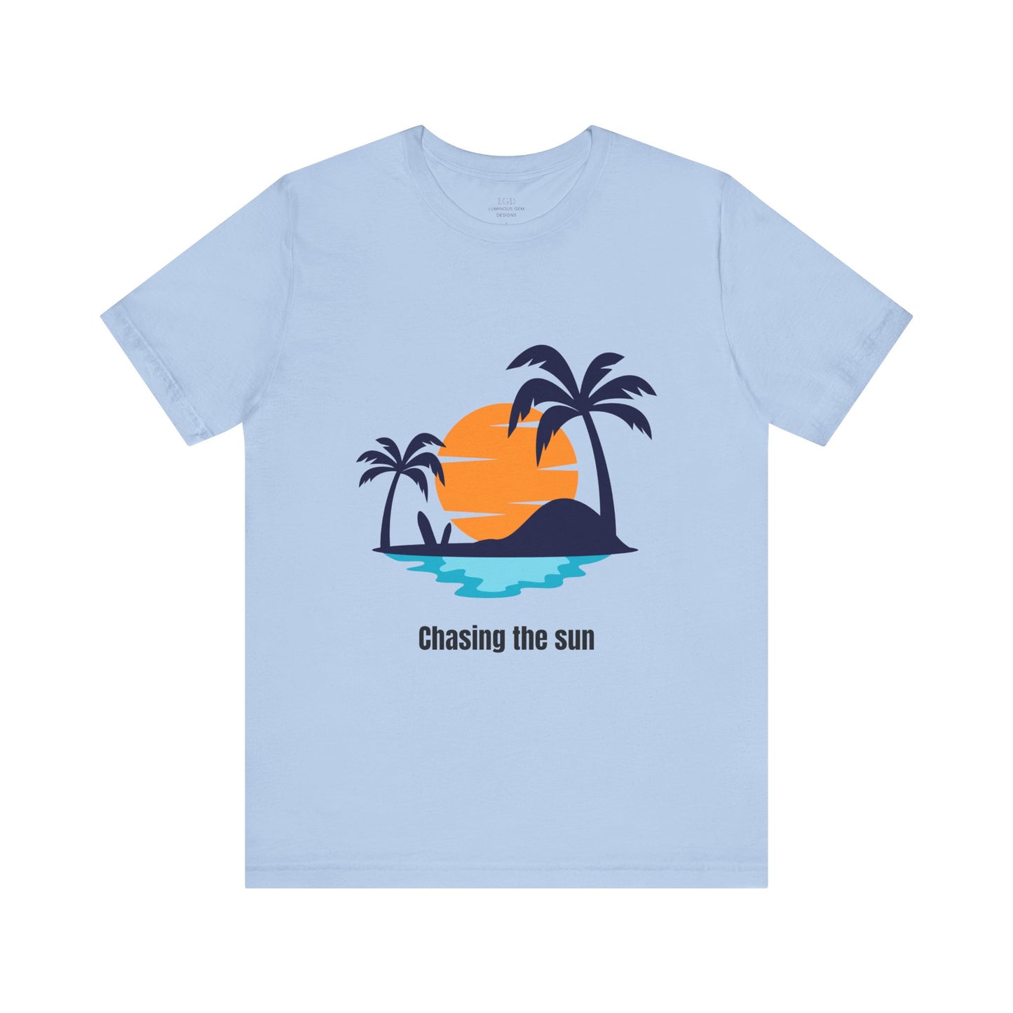 Comfy and trendy blue "Chasing the Sun" T-shirt with a scenic island and palm tree design. Perfect for beach lovers and summer adventures. Soft, breathable cotton with a relaxed crew neck fit. Available in XS, S, M, L, XL, 2XL, 3XL. Luminous Gem Designs