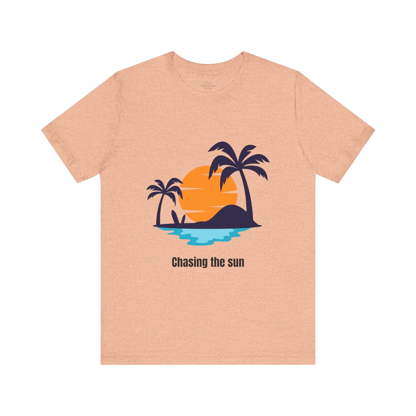 Versatile ash heather "Chasing the Sun" T-shirt with a tropical design. Ultra-soft and trendy for casual styling. Available in XS, S, M, L, XL, 2XL, 3XL. Luminous Gem Designs