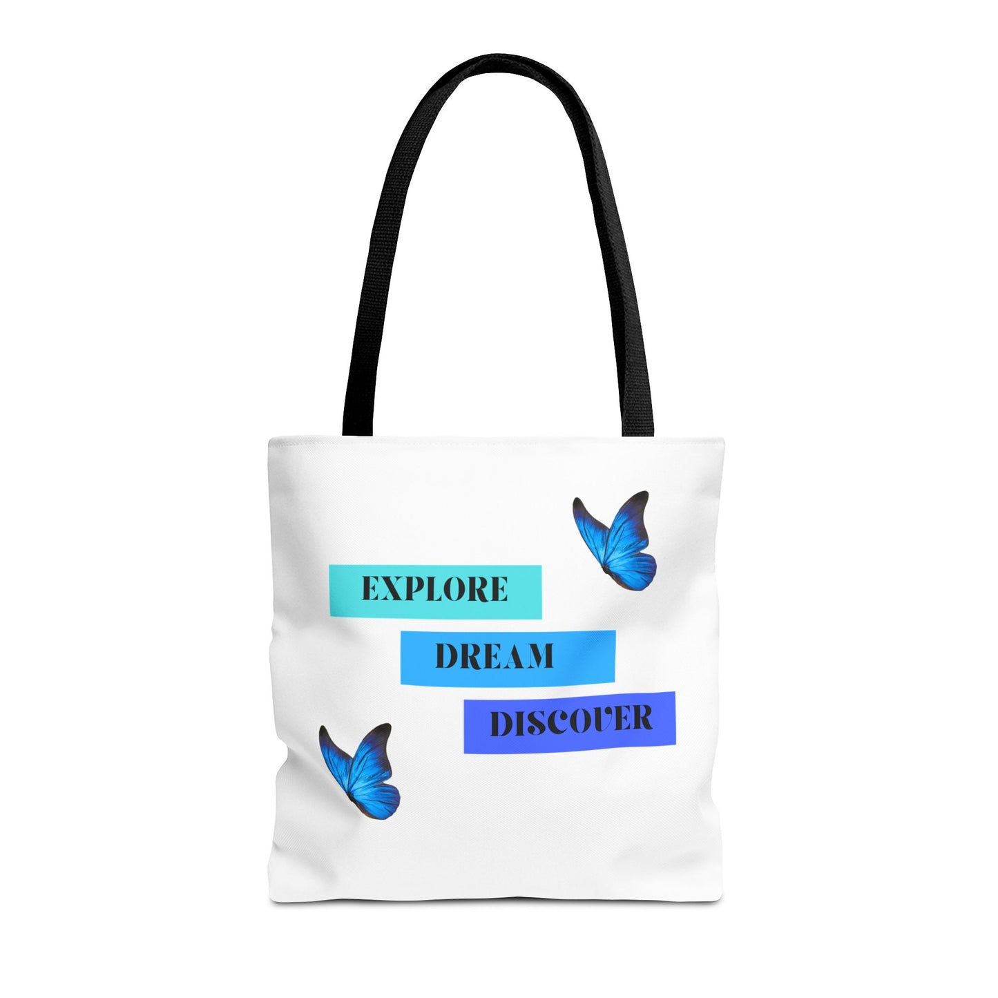 Charming white Explore, Dream, Discover tote bag with black handles, featuring a positive, butterfly-themed design. Made from 100% polyester, this tote is perfect for adventurers and creatives. Available in sizes 13"x13", 16"x16", 18"x18". Luminous Gem Designs.