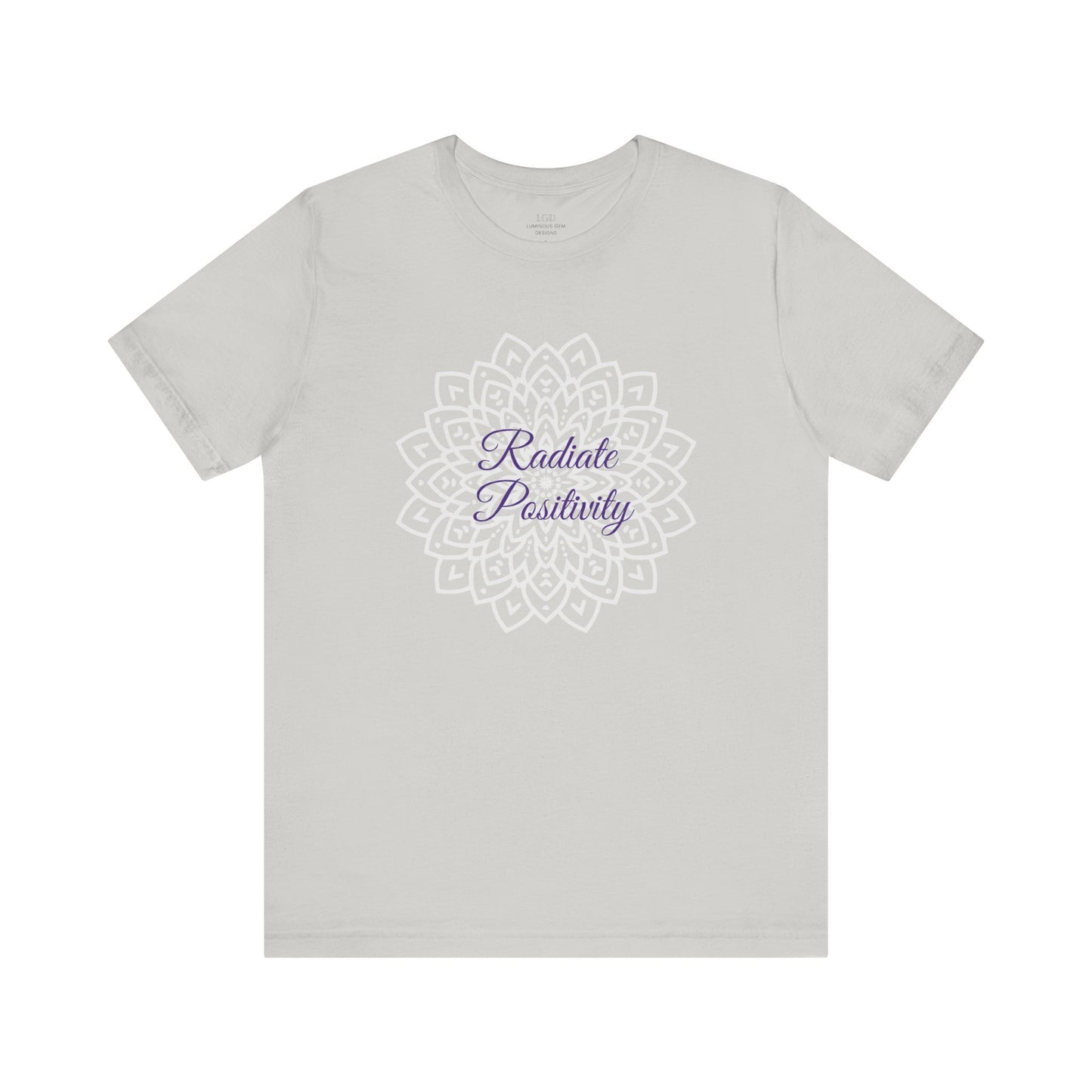 Elegant silver "Radiate Positivity" T-shirt with a beautifully intricate mandala background. A versatile and uplifting choice for casual wear. Sizes: XS, S, M, L, XL, 2XL, 3XL. Luminous Gem Designs.