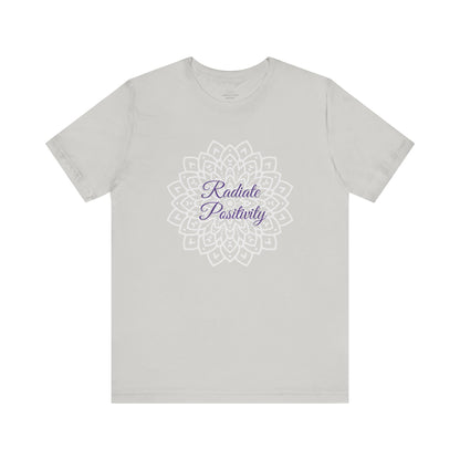 Elegant silver "Radiate Positivity" T-shirt with a beautifully intricate mandala background. A versatile and uplifting choice for casual wear. Sizes: XS, S, M, L, XL, 2XL, 3XL. Luminous Gem Designs.