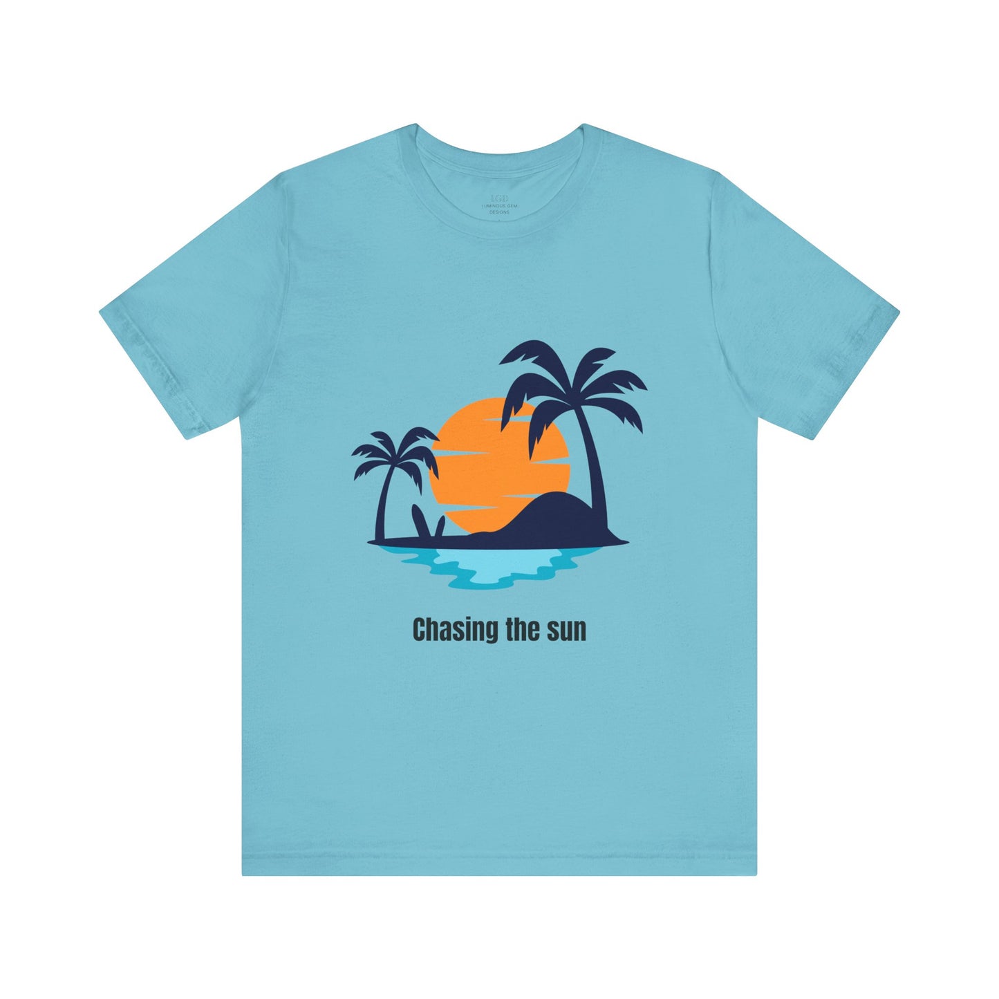 Eye-catching turquoise "Chasing the Sun" T-shirt, great for summer lovers and travelers. Comfy, soft, and lightweight for all-day wear. Available in XS, S, M, L, XL, 2XL, 3XL. Luminous Gem Designs