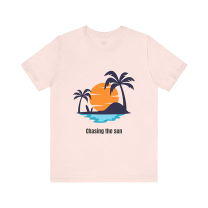 Chic soft pink "Chasing the Sun" T-shirt, perfect for those who love stylish and uplifting designs. Comfortable, breathable cotton in XS, S, M, L, XL, 2XL, 3XL. Luminous Gem Designs