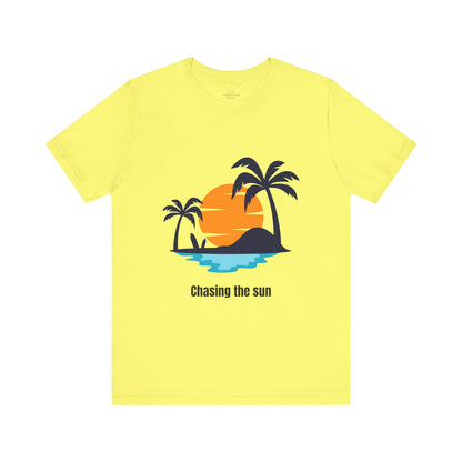 Bright yellow "Chasing the Sun" T-shirt, ideal for adding sunshine to your wardrobe. Lightweight, breathable, and comfortable. Sizes: XS, S, M, L, XL, 2XL, 3XL. Luminous Gem Designs