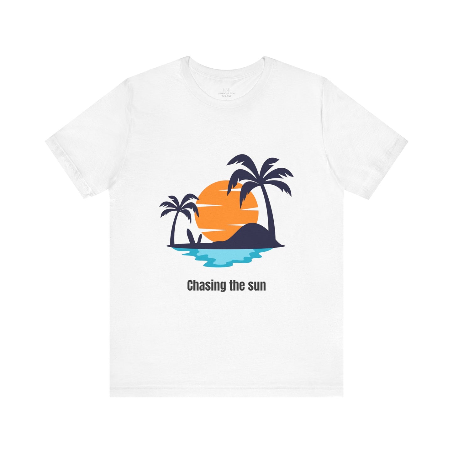 Crisp white "Chasing the Sun" T-shirt with a stylish beach-inspired design. Classic, breathable, and perfect for everyday wear. Available in XS, S, M, L, XL, 2XL, 3XL. Luminous Gem Designs